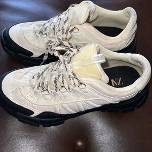 This is a pair of cream hiking contrasting sneakers/mountain trainers NWOT